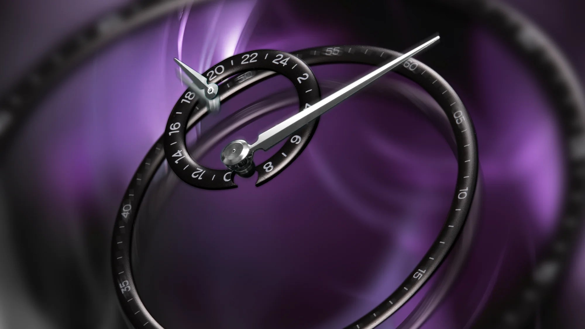 Multi-level, with semi-shiny rings and a sunray-finished, fumé, and lacquered dial base.