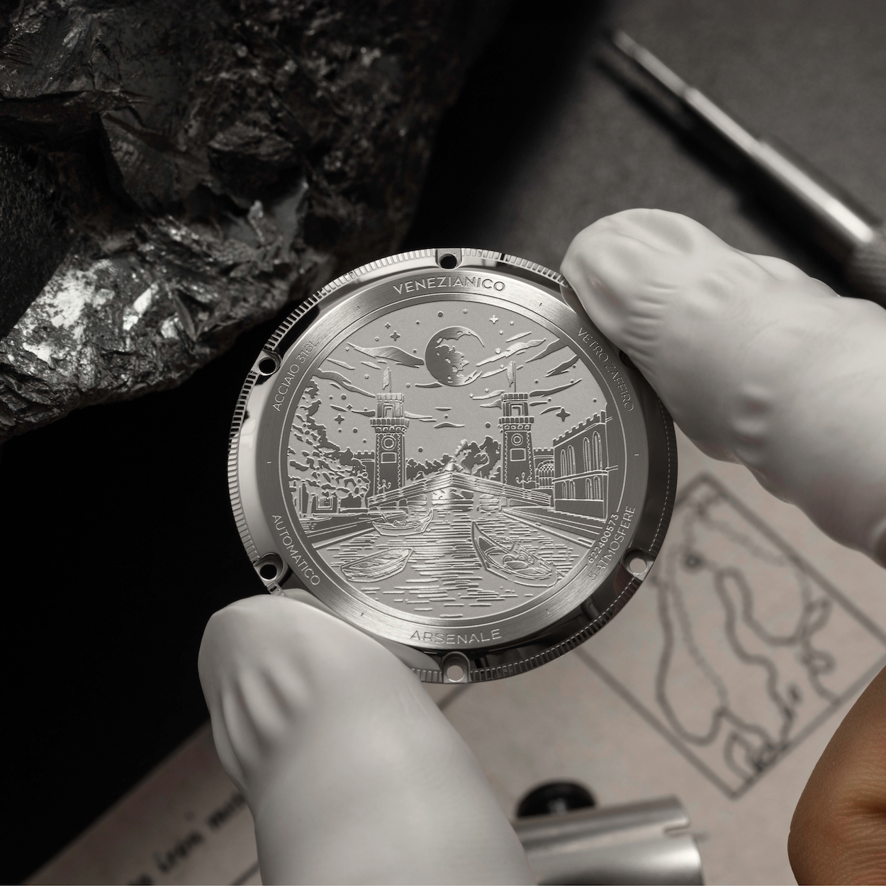 engraved caseback with towers of arsenale of venice