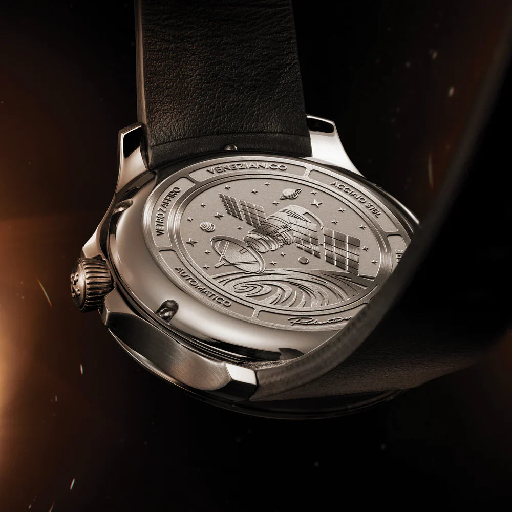 engraved caseback with space and satellite